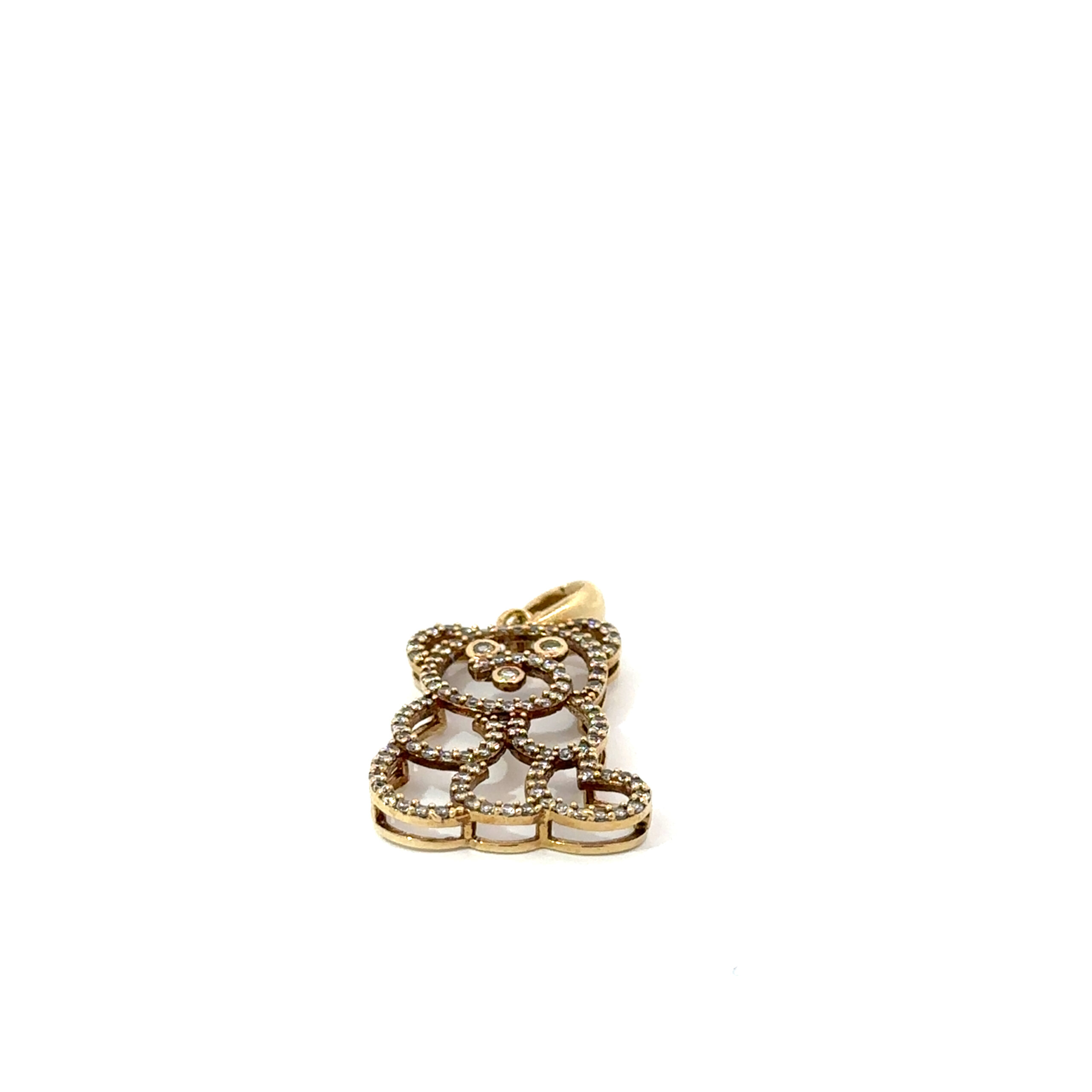 Angled view of a 10k yellow gold diamond teddy bear pendant from John's Loan & Jewelry, showing the pave setting and reflective gold frame, emphasizing the jewelry's design.