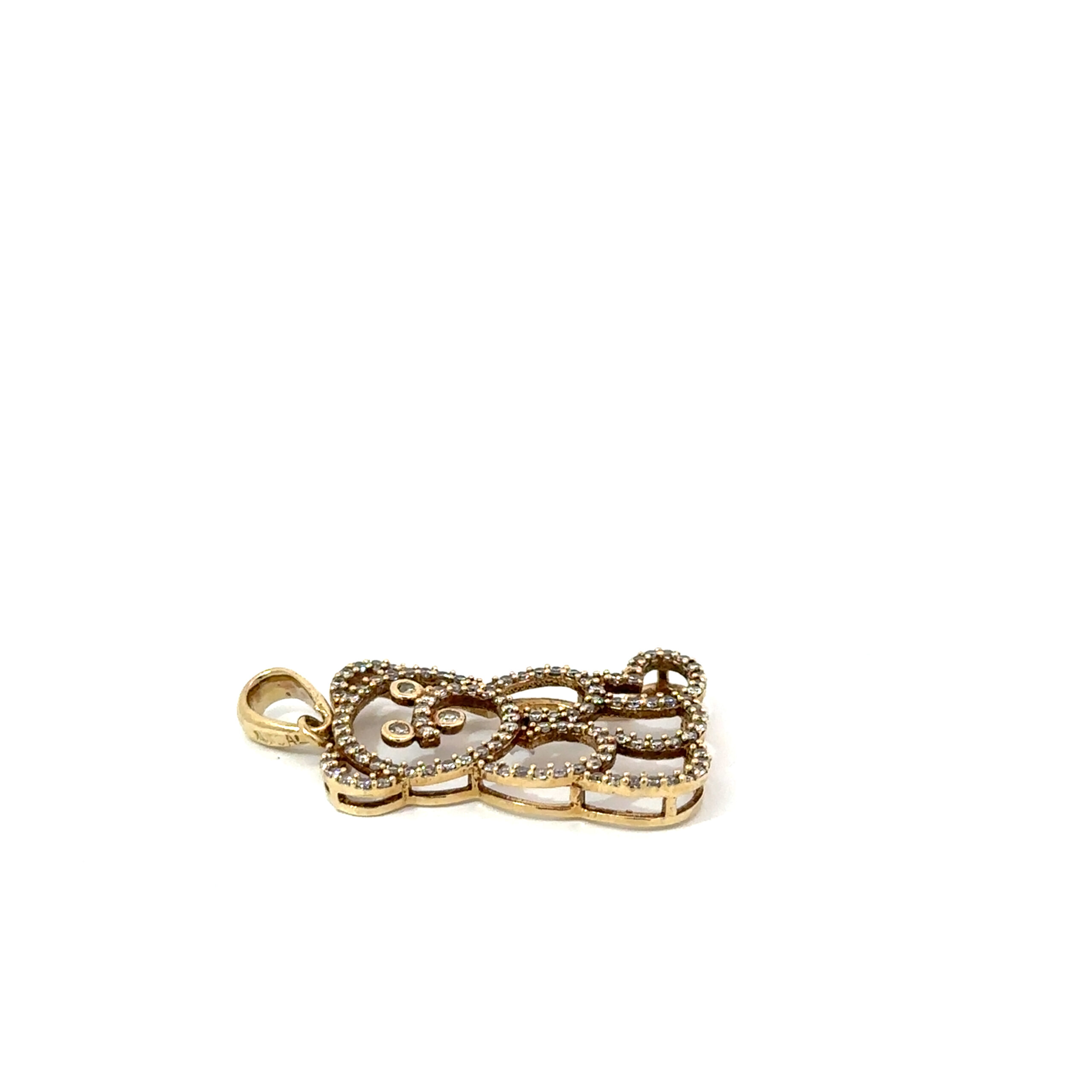Side-profile of John's Loan & Jewelry diamond pendant; a 10k yellow gold teddy bear charm with pave diamonds, displaying the jewelry's form and precious metal construction.