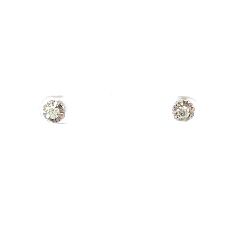 Close-up image presenting John's Loan & Jewelry 18kt white gold stud earrings; showcasing the .2ct diamond setting and precision jewelry craftsmanship.