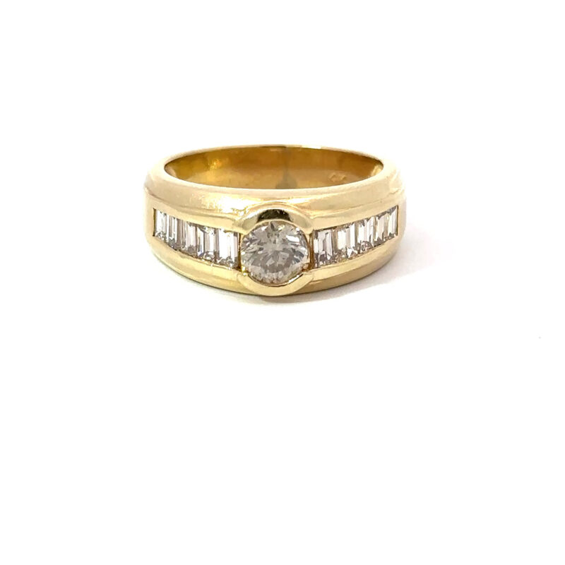 Close-up image of a 14k men's gold band ring from John's Loan & Jewelry featuring a round brilliant diamond center stone and channel-set baguette diamonds on a white table.