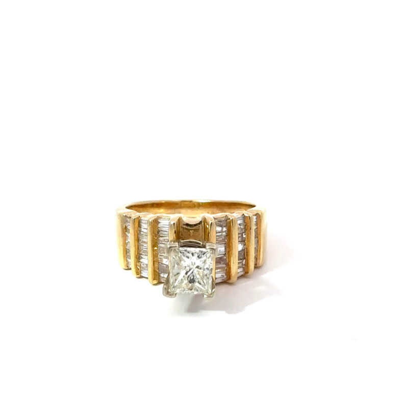 Close-up of a 14kt yellow gold ladies' engagement ring from John's Loan & Jewelry, featuring a 1ct princess cut solitaire diamond and a stepped table design.