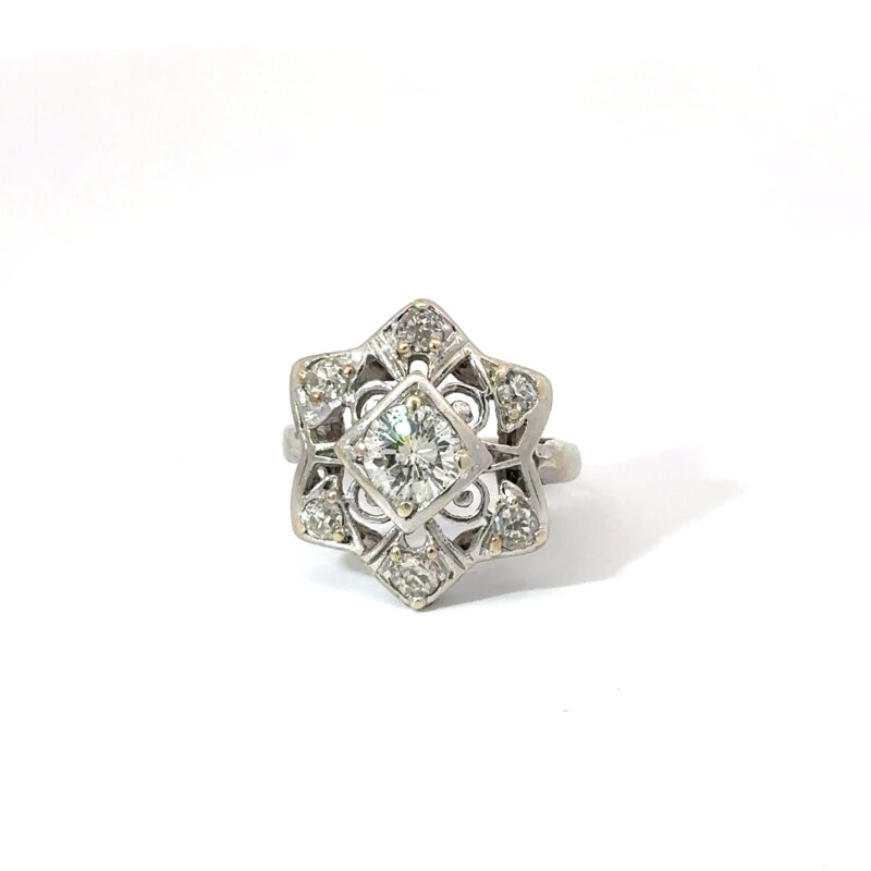 Front-facing studio shot of John's Loan & Jewelry 14k white gold ring. A six-pointed star design features center and accent diamonds in an Art Deco style, set on a white table.